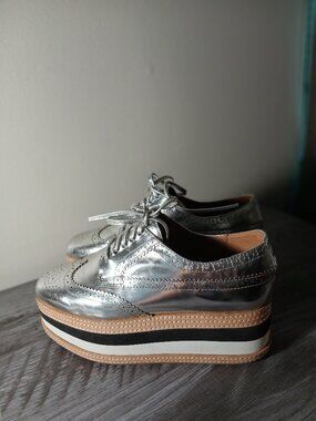 Jeffrey Cambell.  Chrome Wingtip Platform heels